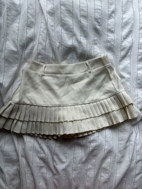 Edikted Cream Pleated Mini Skirt with Ruffle Layers
